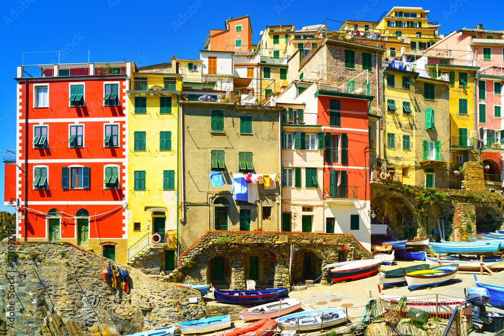 Riomaggiore village street, boats and houses. Cinque Terre, Ligu