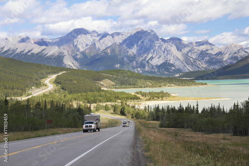 Winding Highway Next to a Mountain Lake - Alberta, Canada