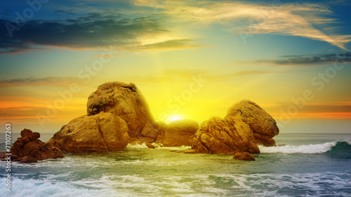 sea landscape with rocky island and the sunrise