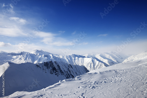 Snowy mountains at sun day