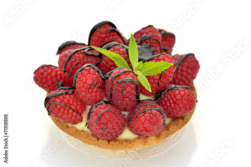 Raspberry tartlet on white background