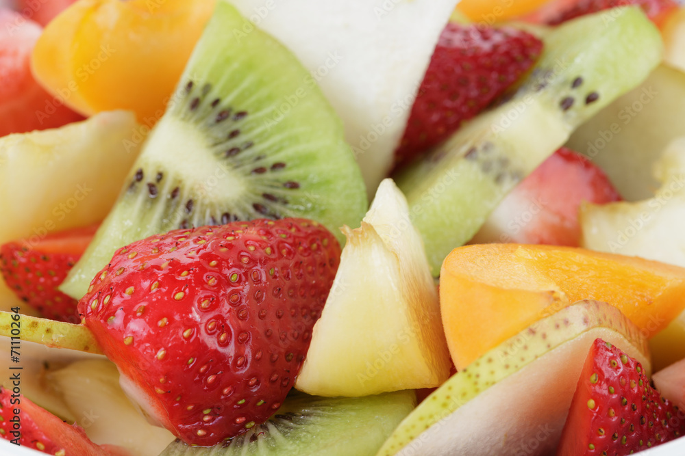 fresh mix fruit salad with strawberry, kiwi and peach fresh mix fruit salad with strawberry, kiwi and peach