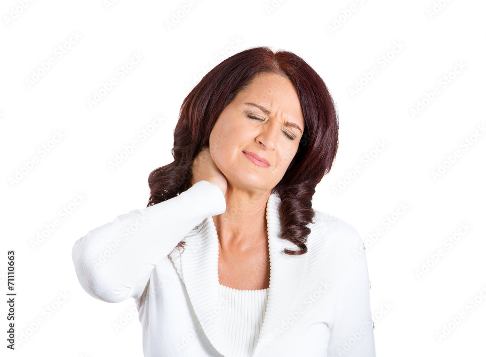 unhappy woman with bad neck pain isolated on white background unhappy woman with bad neck pain isolated on white background
