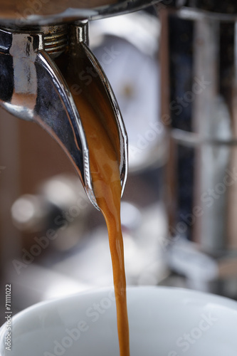 pouring simple espresso with coffee machine