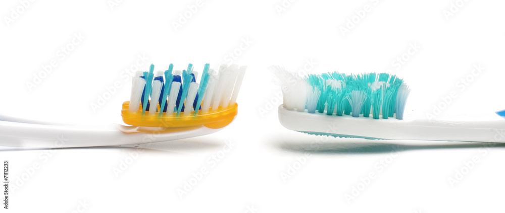 Used and new toothbrush bristles Used and new toothbrush bristles