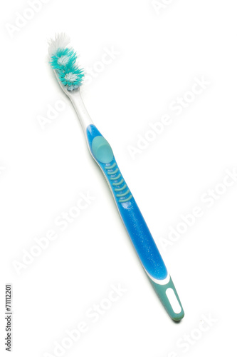 Used toothbrush isolated on the white background