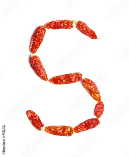 Alphabet letter S arranged from chili peppers isolated