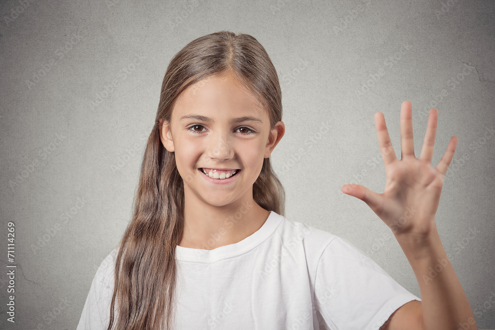 girl making five times sign gesture with hand grey background girl making five times sign gesture with hand grey background