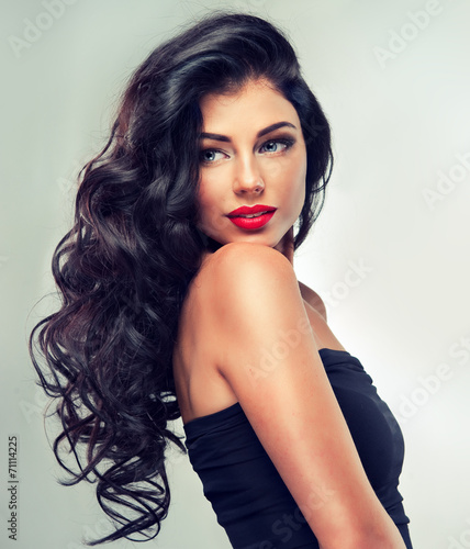 Model brunette with long curly hair