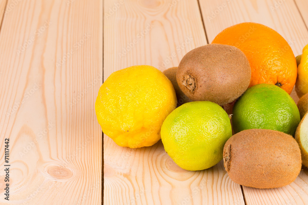 Various exotic fruits on wood table. Various exotic fruits on wood table.