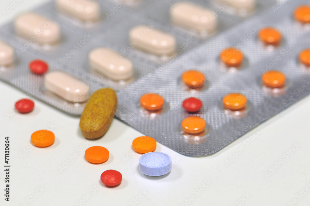 colorful medical therapy with different tablets, and pills colorful medical therapy with different tablets, and pills