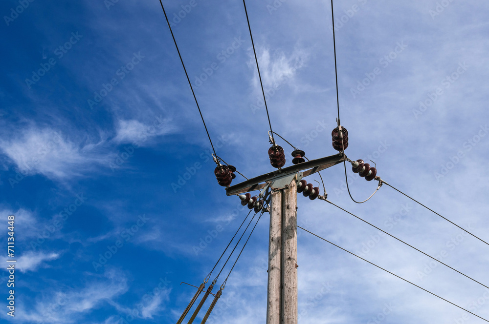 Wooden Power Electricity Pole Pylon,Blue Sky Background Wooden Power Electricity Pole Pylon,Blue Sky Background