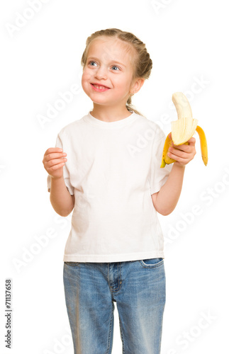 little girl eat banana