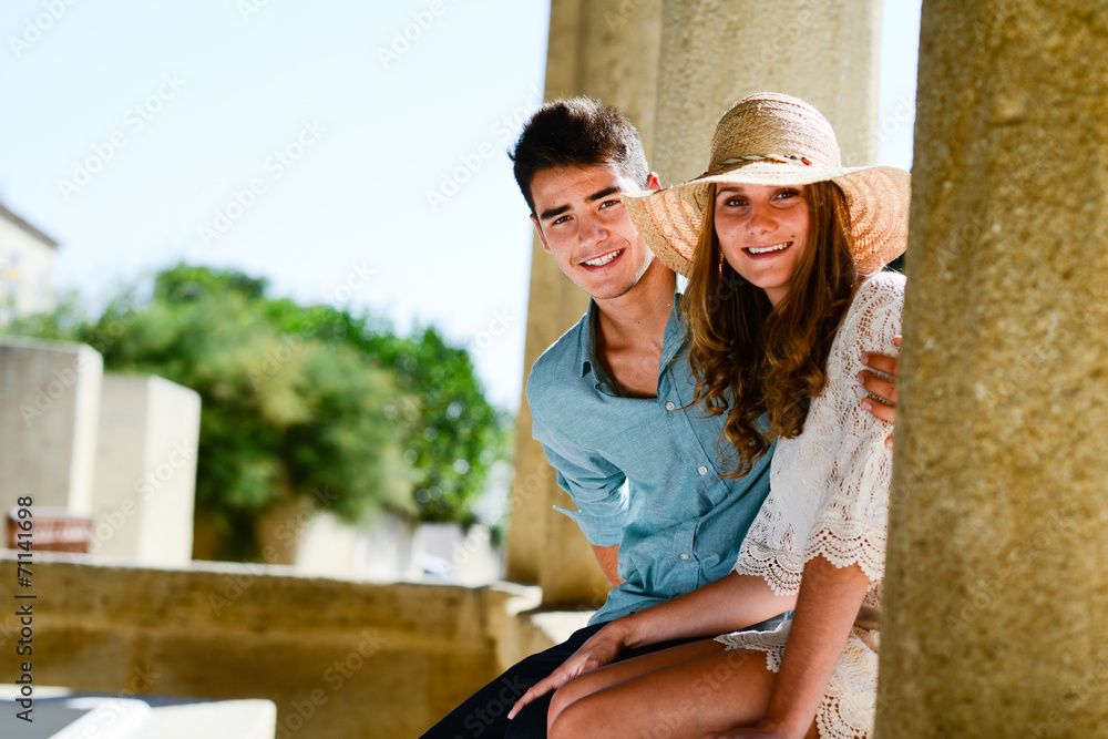 happy young couple teenager first love together in summertime