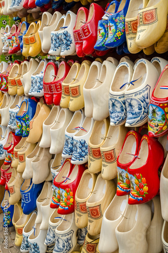 Traditional Dutch clogs wooden shoes in souvenir store Amsterdam
