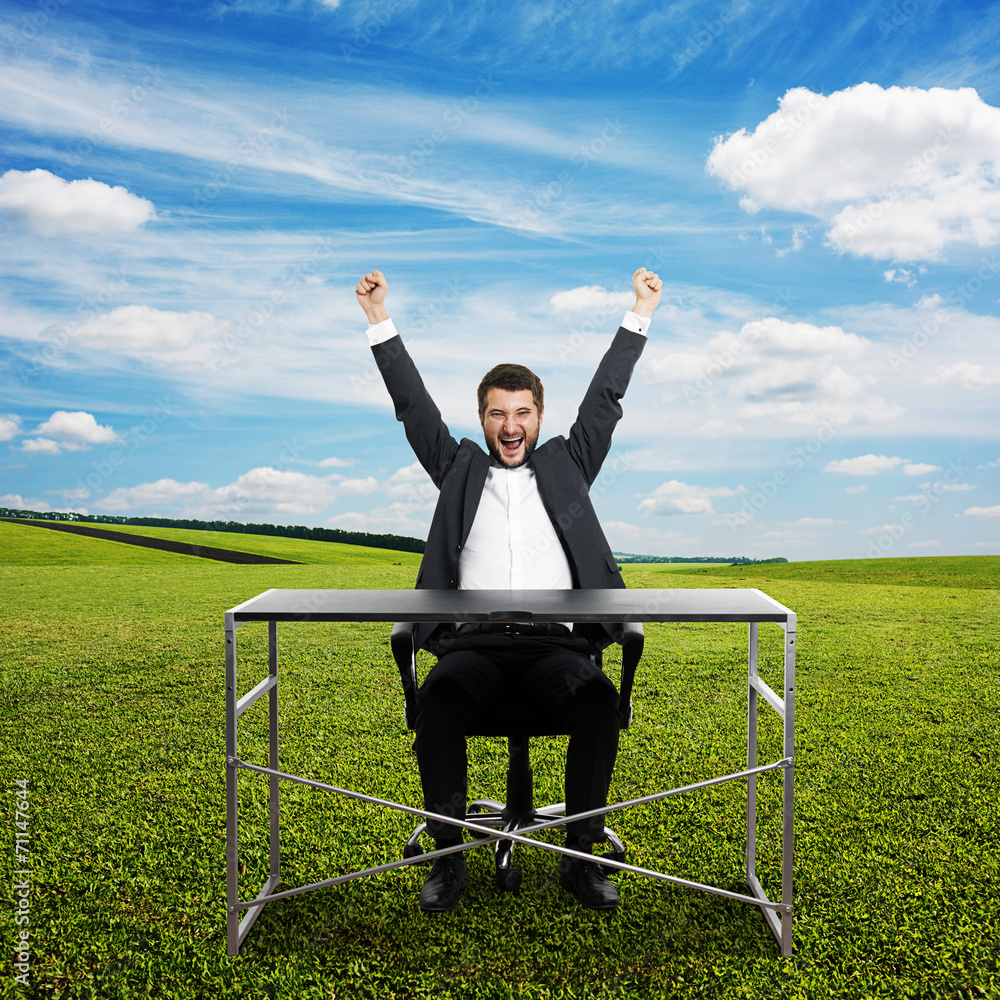 smile man sitting at the table