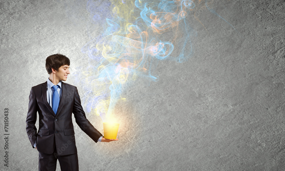 Businessman with small bucket