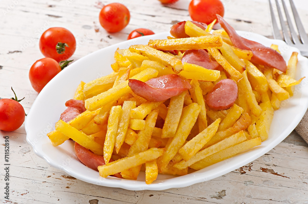 Fried potatoes with sausage on a plate Fried potatoes with sausage on a plate