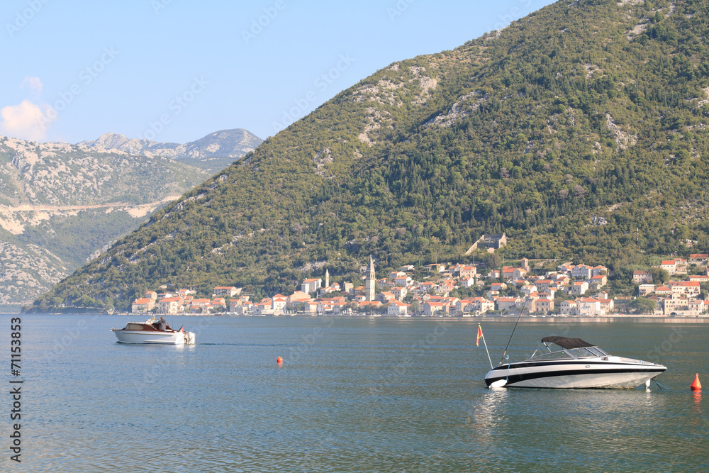 Morning in the Bay of Kotor in Montenegro. Two boats