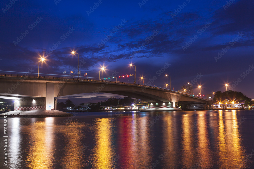 bridge over river in the evening.