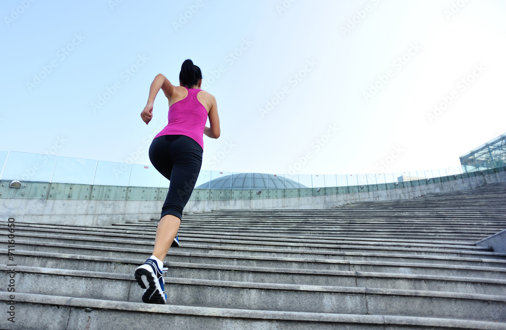 Runner athlete running on stairs