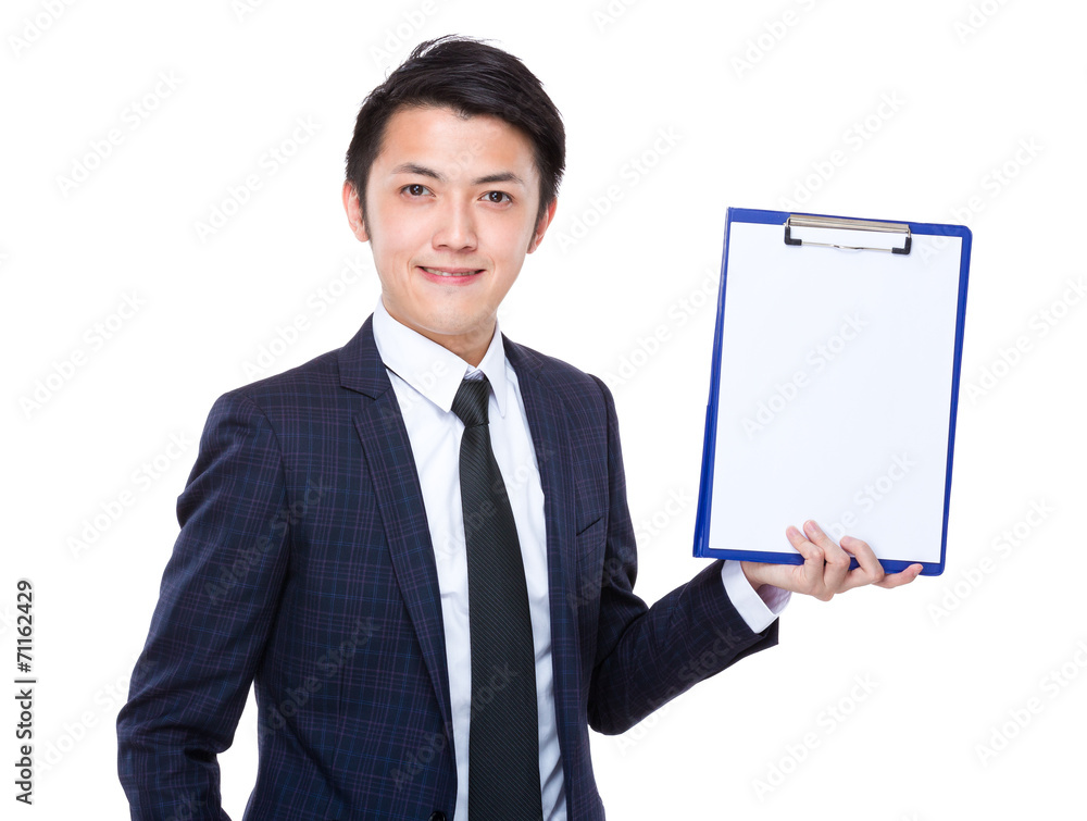 Young businessman show a blank paper of clipboard Young businessman show a blank paper of clipboard