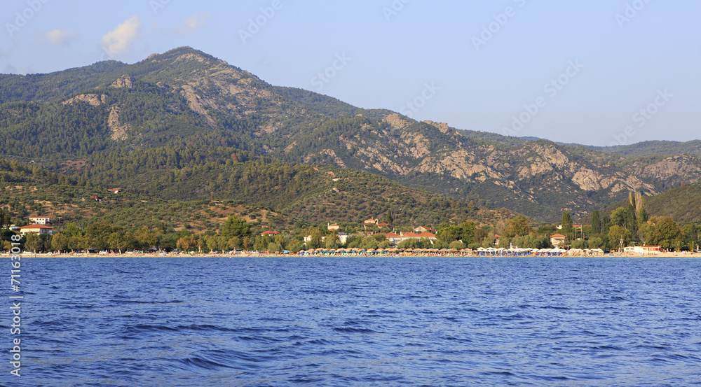 Beach in Neos Marmaras and mountains of Sithonia.
