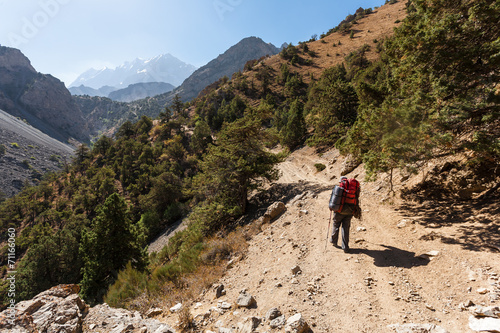 Hiker in high mountains.