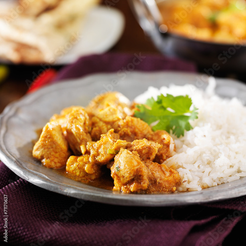 indian butter chicken curry with basmati rice