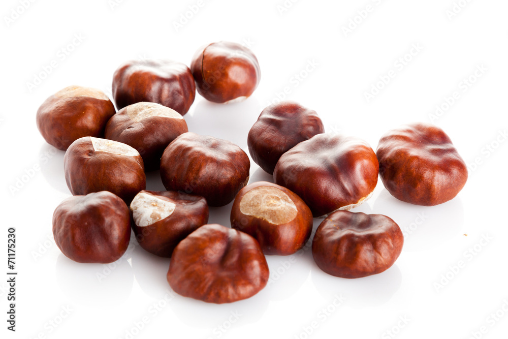 Chestnut on white background. ripe chestnuts Chestnut on white background. ripe chestnuts