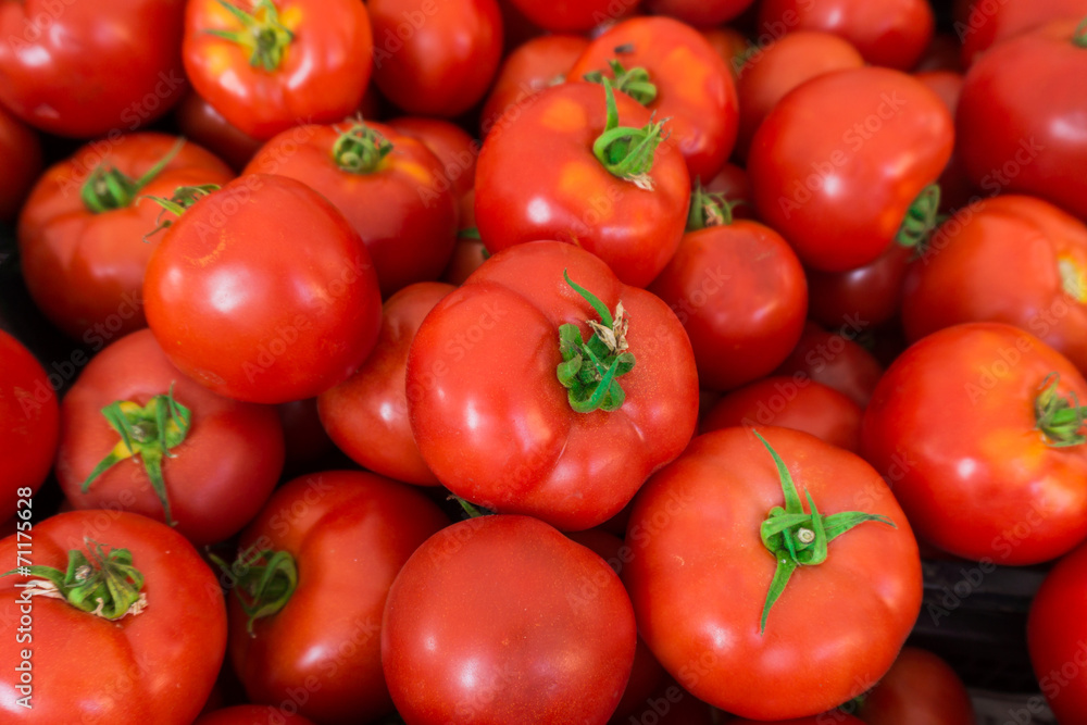 red tomatoes at the market. Fresh ripe tomatoes red tomatoes at the market. Fresh ripe tomatoes