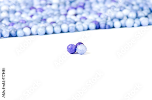 One blue and two violet little pearls