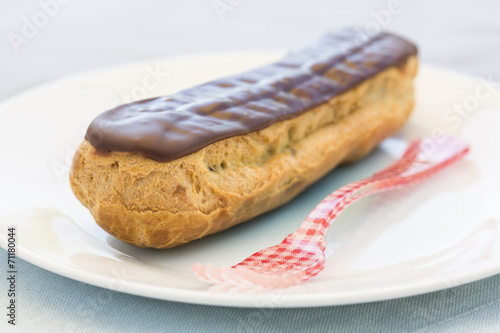 Delicious French Chocolate eclairs on plate