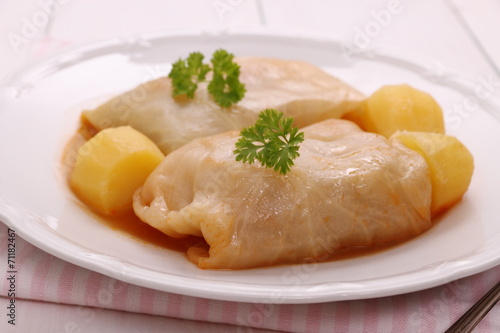 Cabbage rolls with potato, parsley and sauce