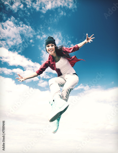 beautiful dancing girl jumping