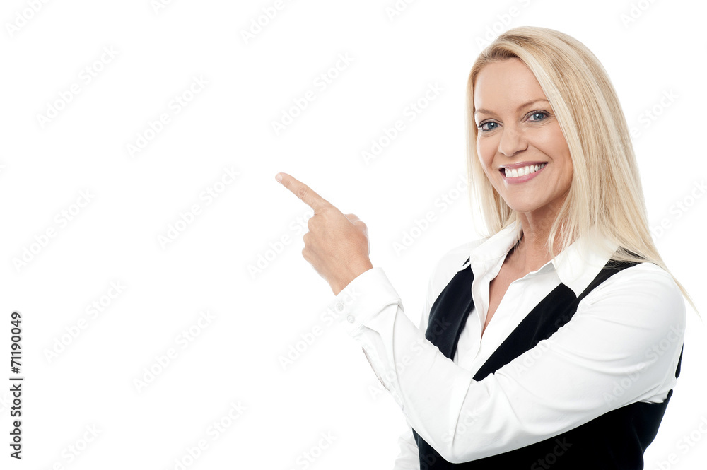 Businesswoman pointing, isolated on white Businesswoman pointing, isolated on white