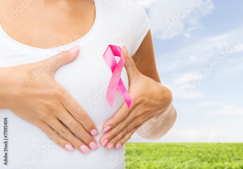 Wallpaper Mural close up of woman with cancer awareness ribbon Torontodigital.ca