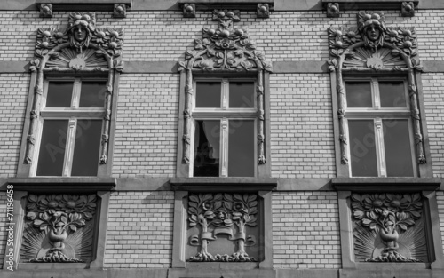 Architectural details on the facade of Art Noveau tenement
