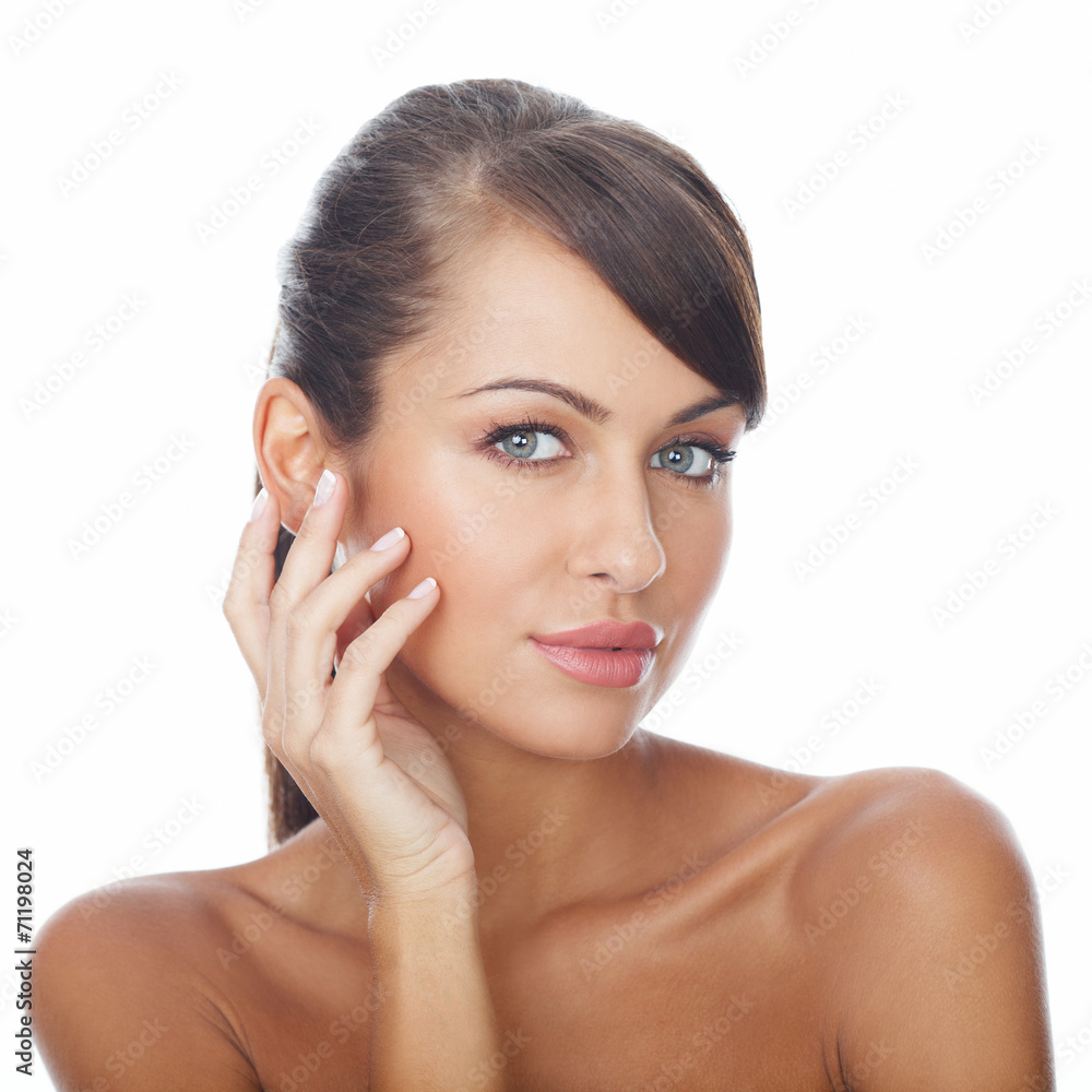 Brunette Woman Touching Face with Hand