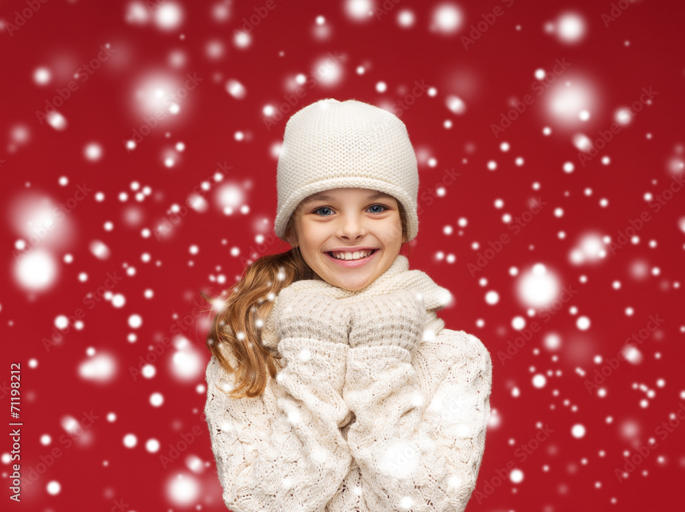 smiling girl in white hat, muffler and gloves smiling girl in white hat, muffler and gloves