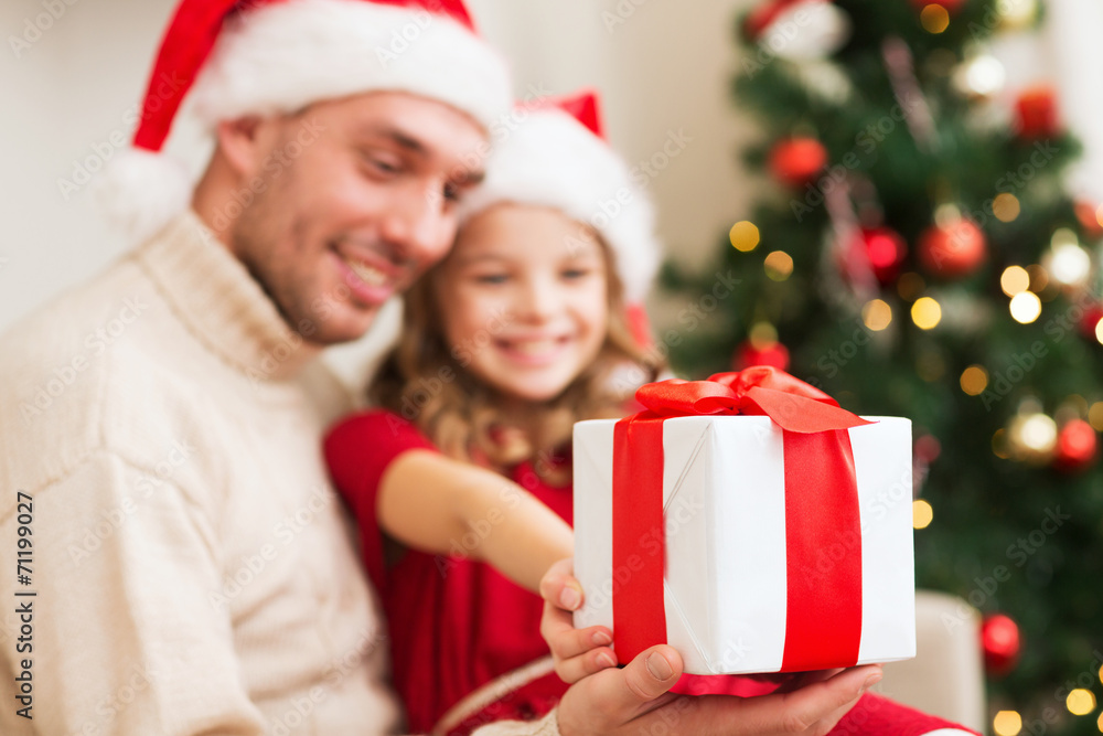 close up of father and daughter with gift box close up of father and daughter with gift box