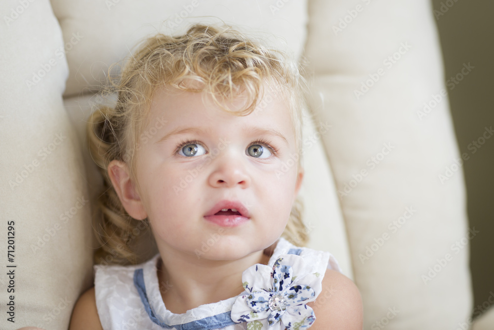 Adorable Blonde Haired and Blue Eyed Little Girl in Chair Adorable Blonde Haired and Blue Eyed Little Girl in Chair