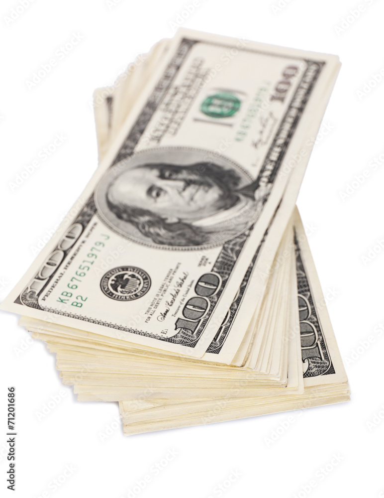 Stack of one hundred dollars banknotes isolated on white Stack of one hundred dollars banknotes isolated on white