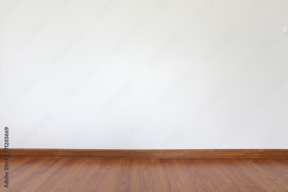 white mortar wall and wood floor in the room - obrazy, fototapety, plakaty 