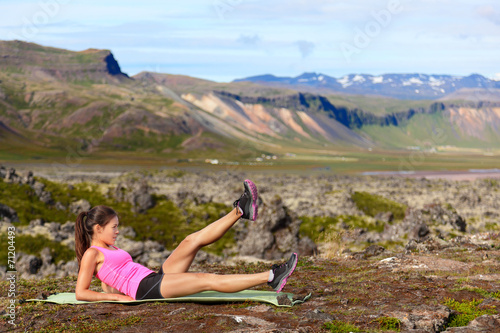 Fitness woman exercising in nature