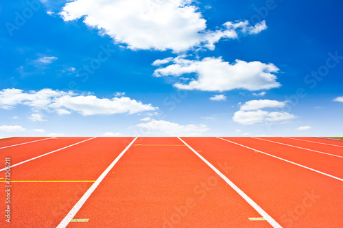 Running track with blue sky