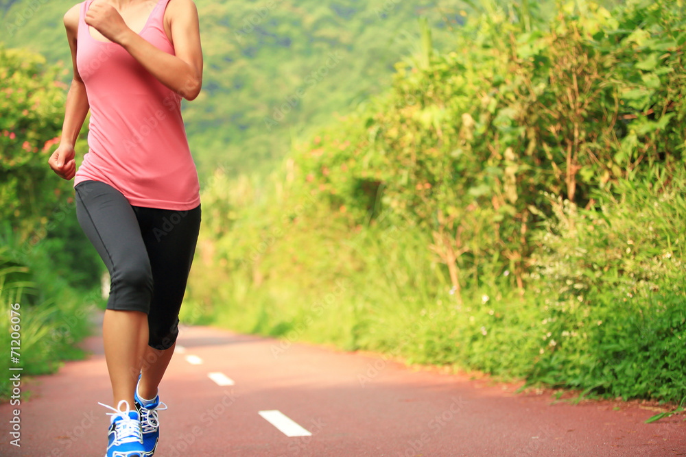 fitness woman runner running on trail fitness woman runner running on trail