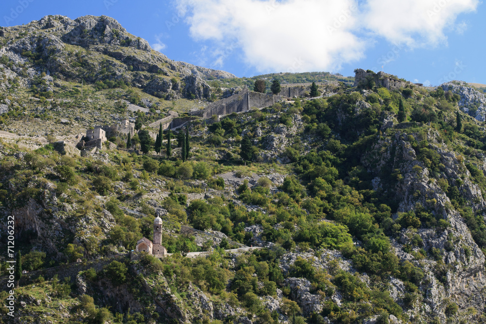 Naklejka premium Medieval citadel in the mountains. Kotor, Montenegro