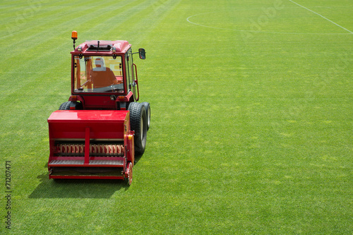Sowing grass in the football stadium