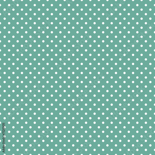 Polka dots on mint green background